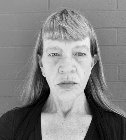 Black and white head shot of instructor, Jennifer Blue