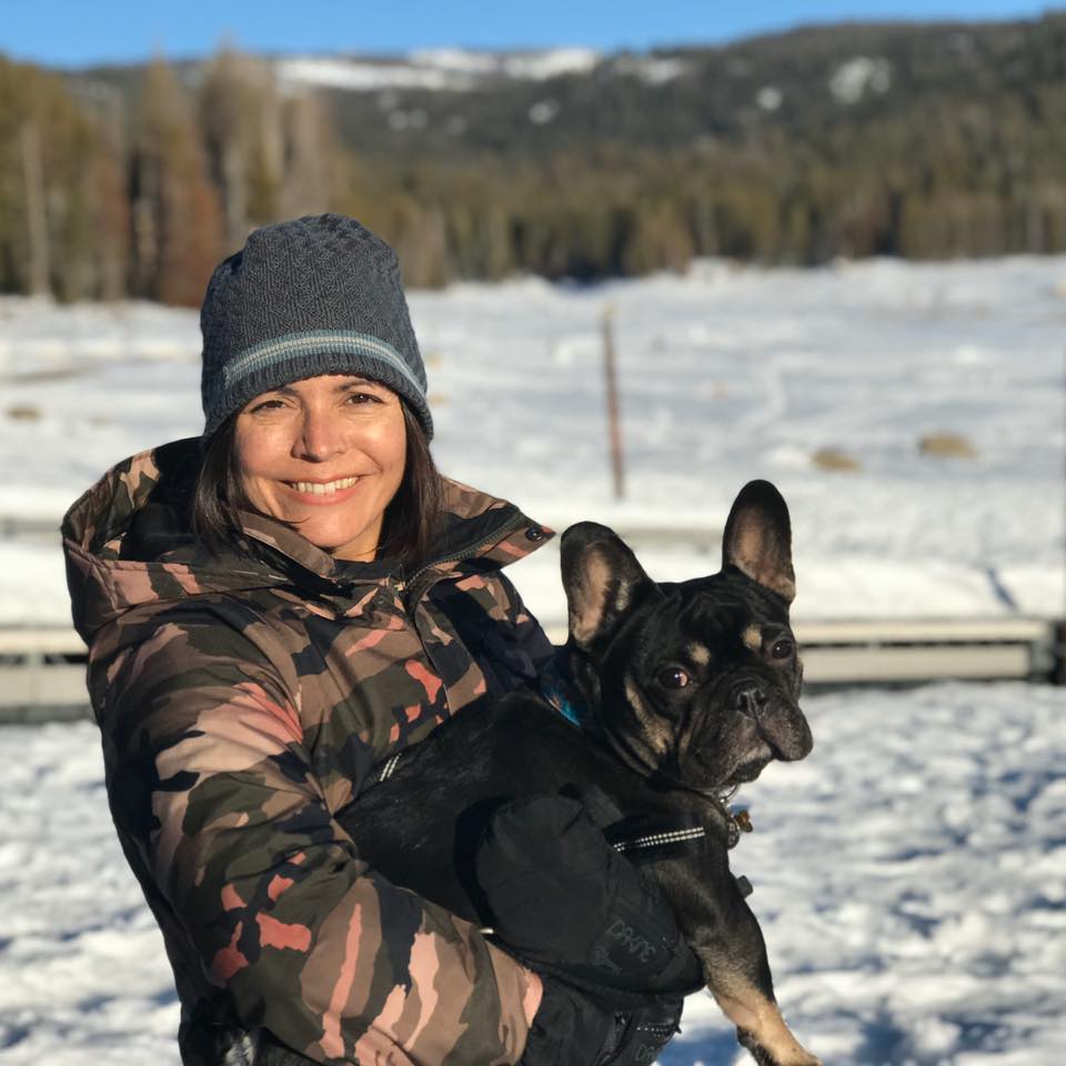 Image of instructor holding her dog