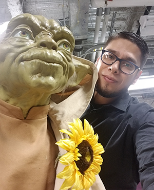 Photo of Juan Renteria with Yoda