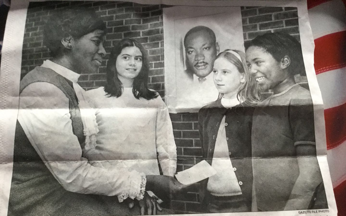 a picture of Karith Meyers in the white headband, 4th grade committee member to honor the work of MLK