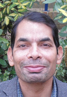 Passport size picture of Prof. Om Tripathi